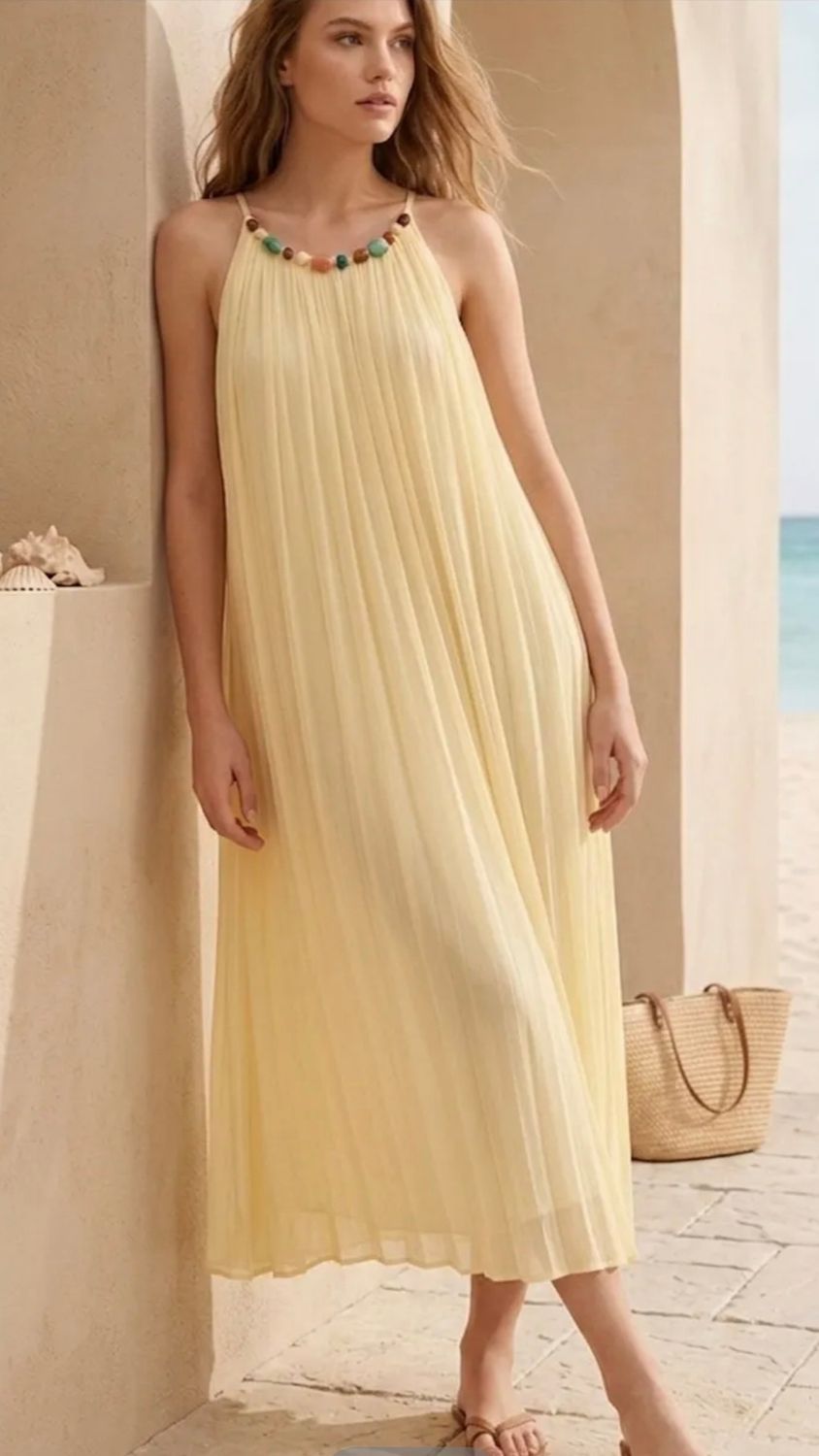 Elegante gele plissé jurk 