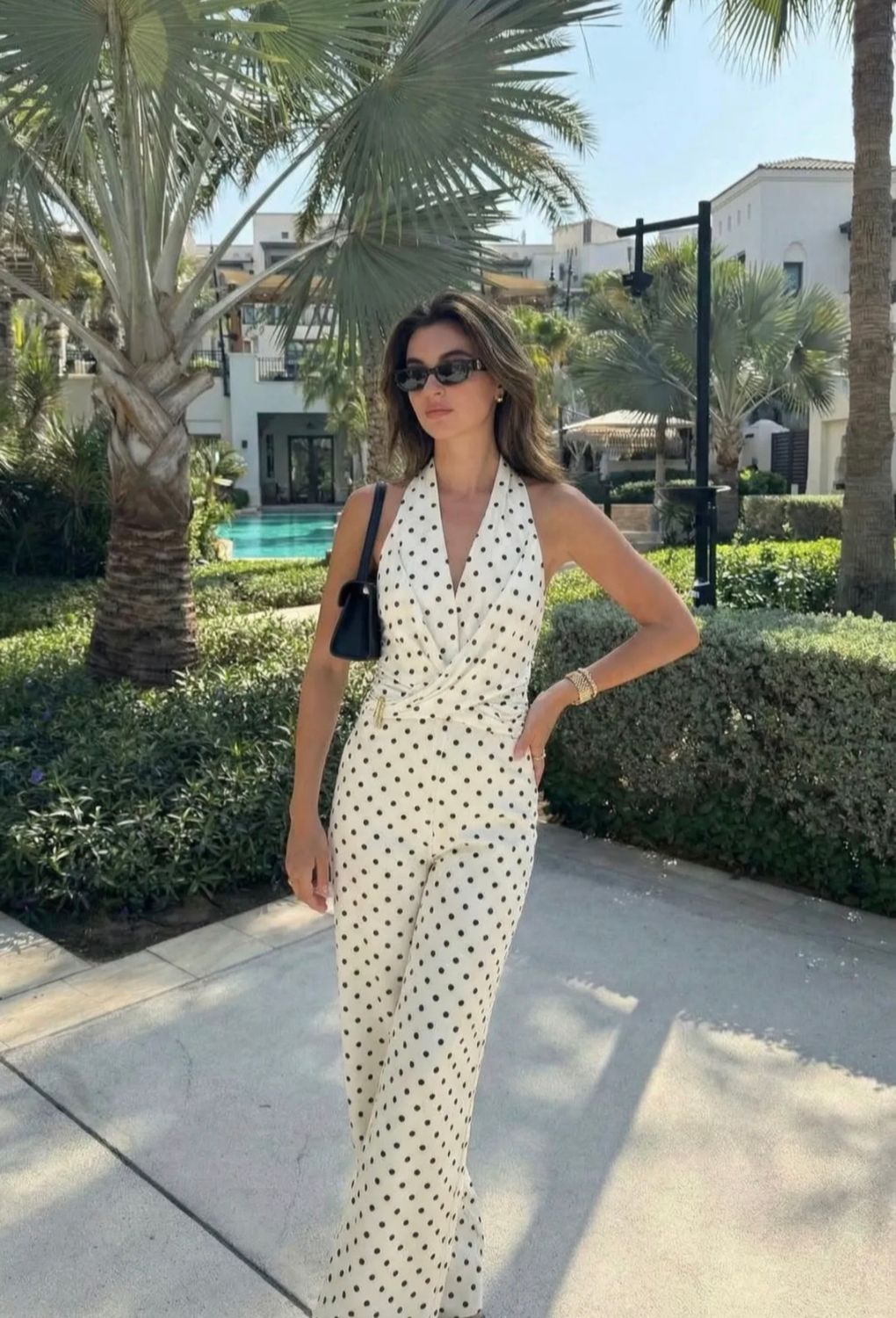 Elegante trendy jumpsuit met stippenprint 