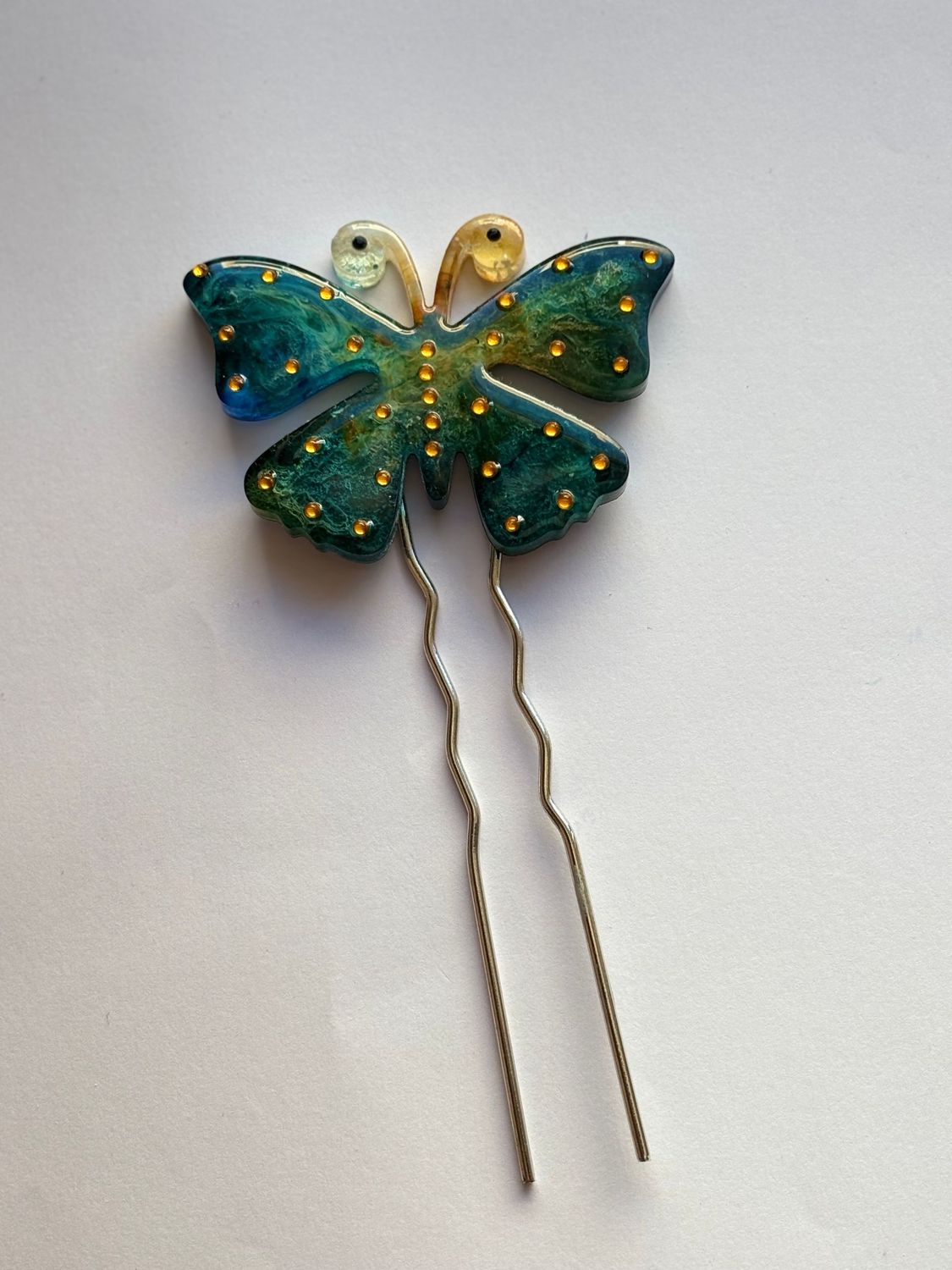 Horquilla pelo mariposa verde y azu