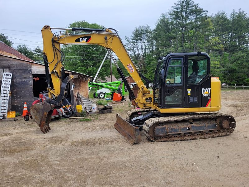 Caterpillar 308 with thumb and backfill blade (21k lb)