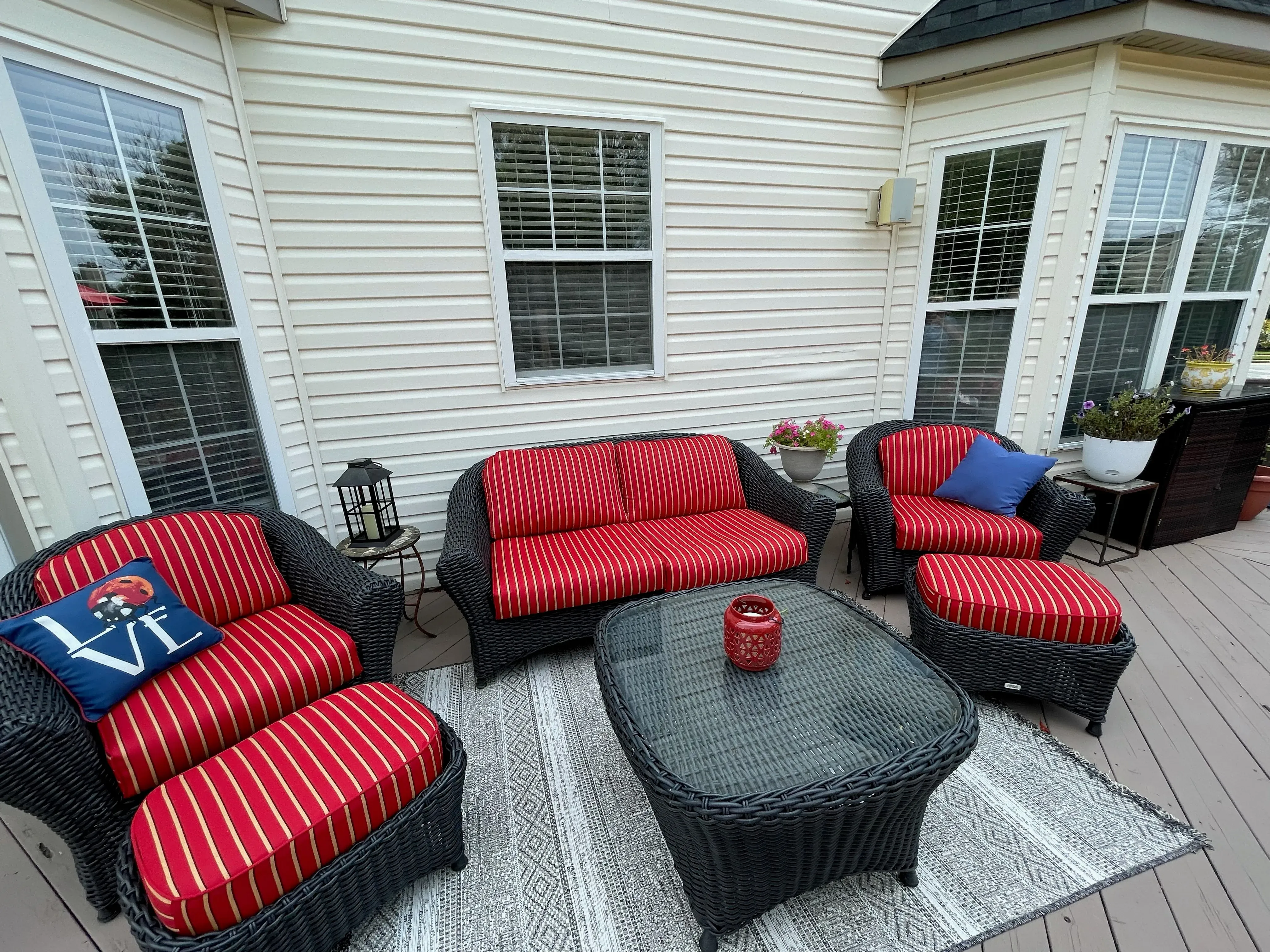 Lake Adela Lounge Chair and Ottoman with Outdoor Custom Cushions installed on a white background