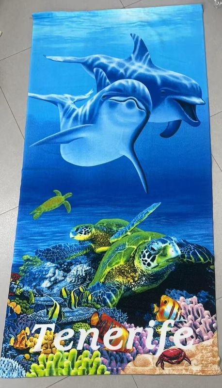 Toalla dos delfines