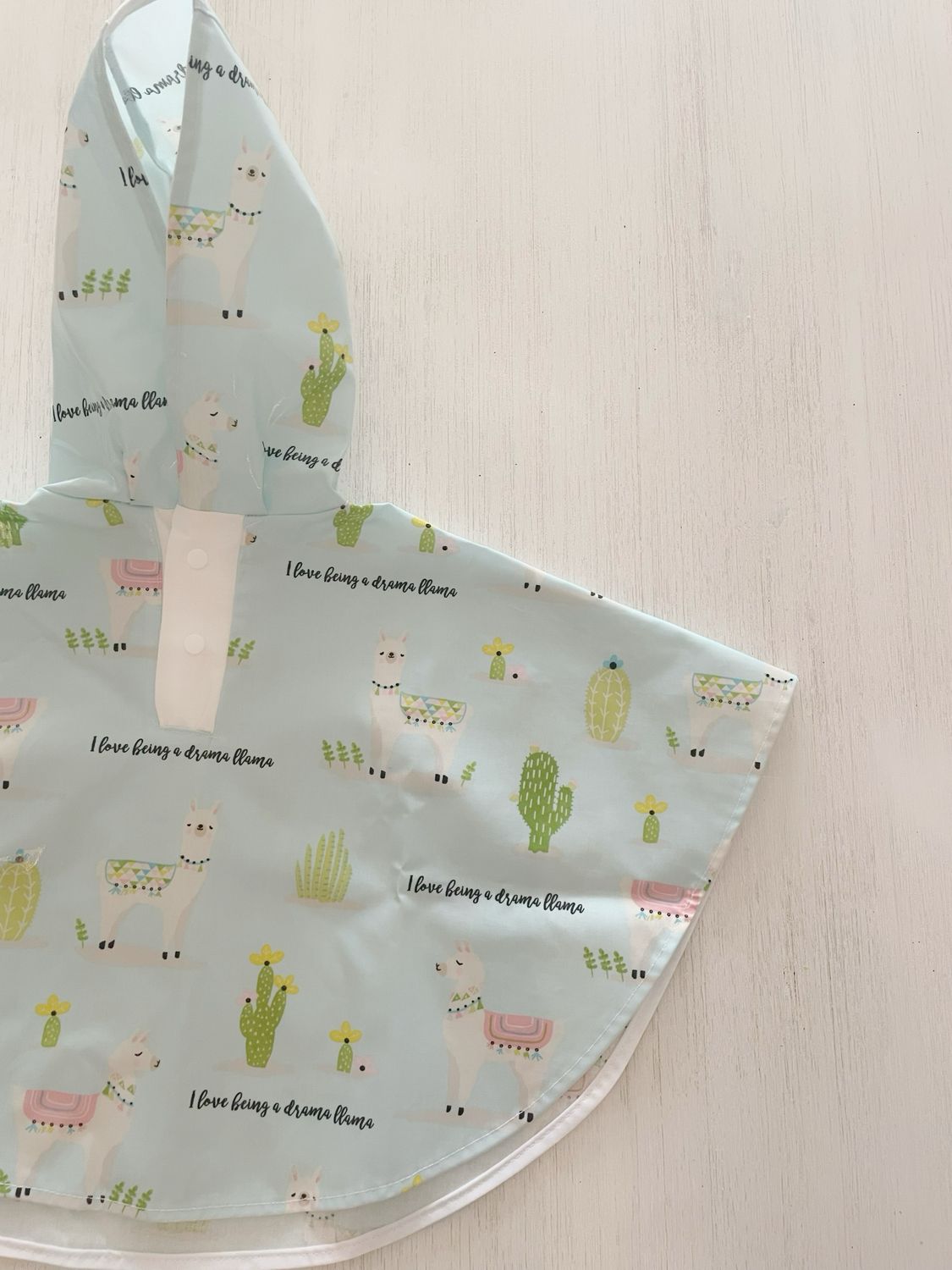 poncho-rain-kids-impermeable-lama