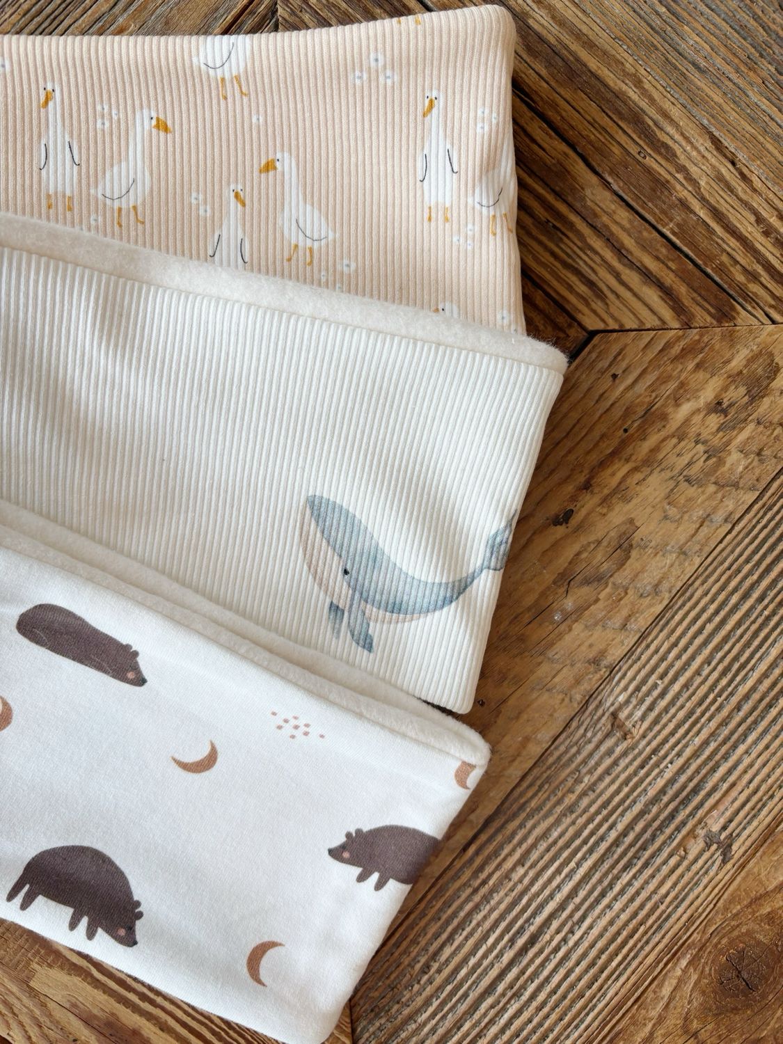 Baby snood in organic cotton fleece