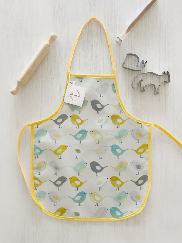 Children's apron in waxed canvas bird
