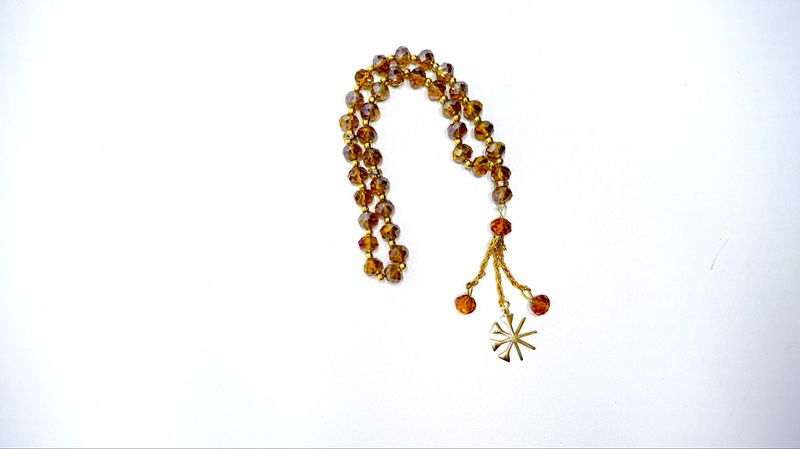 Yezidische Symbol Tesbih in Farbe Gold