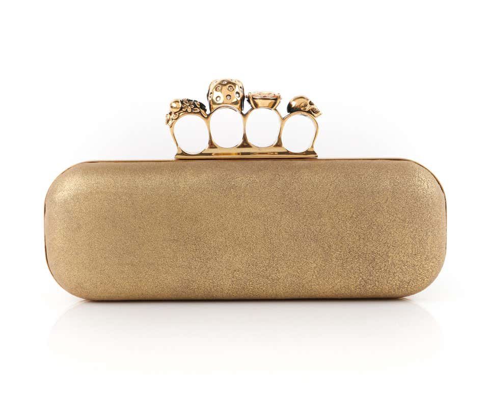 Alexander McQueen gold knuckle clutch