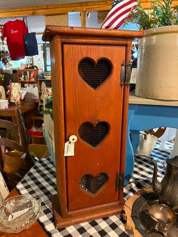 Wooden heart cutout cabinet