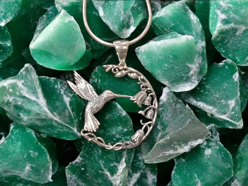Hummingbird On Floral Pendant