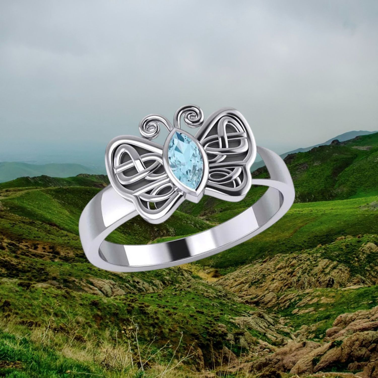 Celtic Butterfly Sterling Ring Blue Topaz