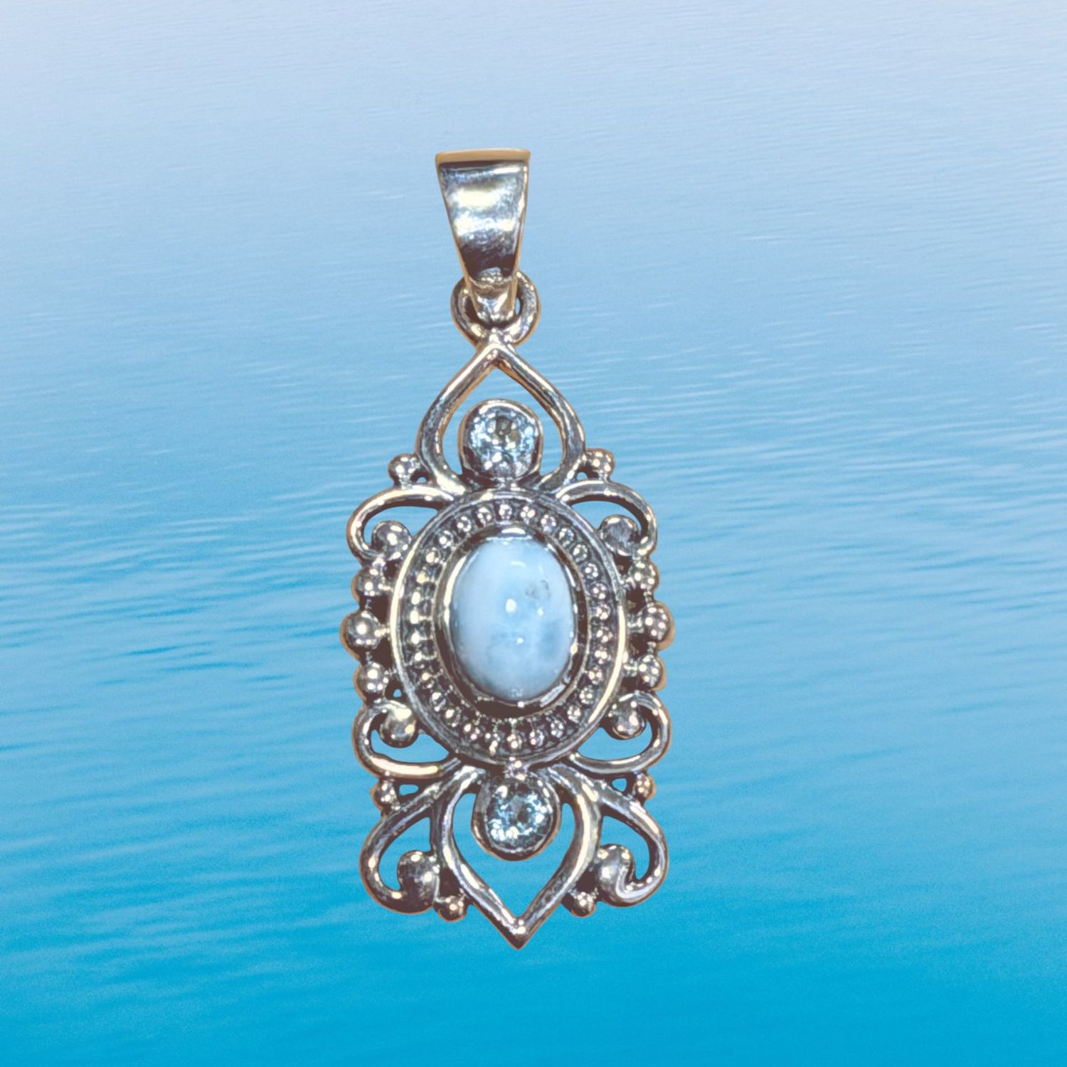 Larimar Scroll Blue Topaz Pendant