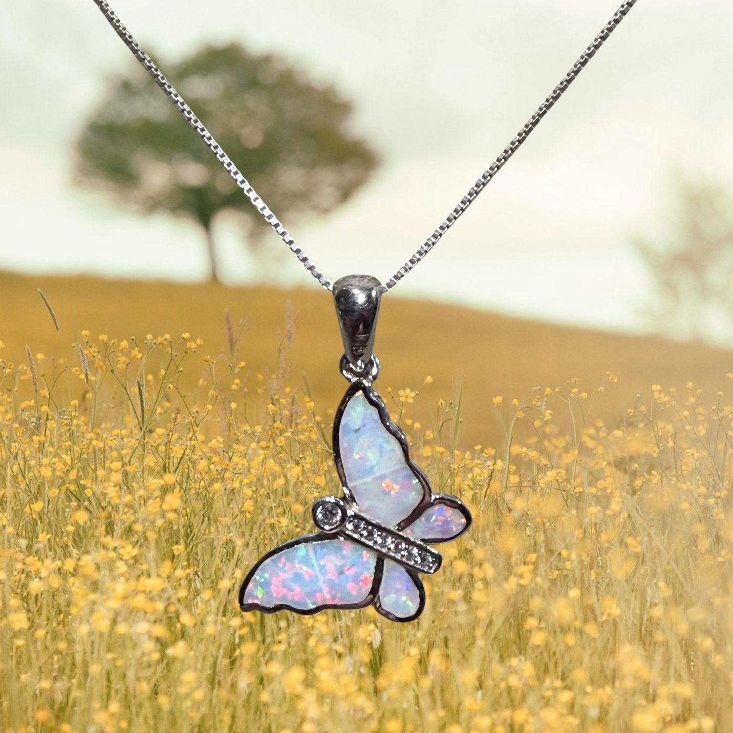 CZ/White Fire Opal Butterfly S/S Pendant