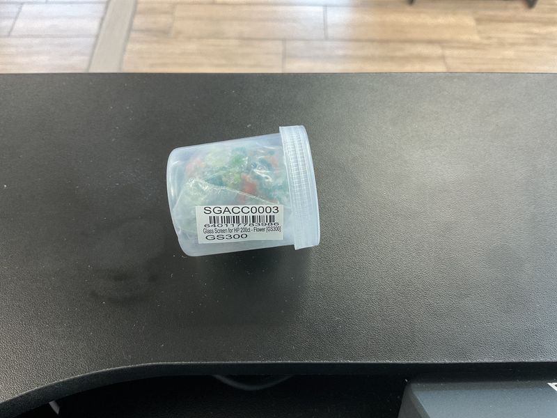 Jar of glass flower screens