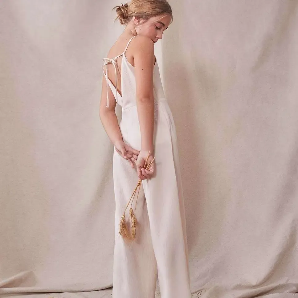 Crèmekleurige jumpsuit, feestcollectie