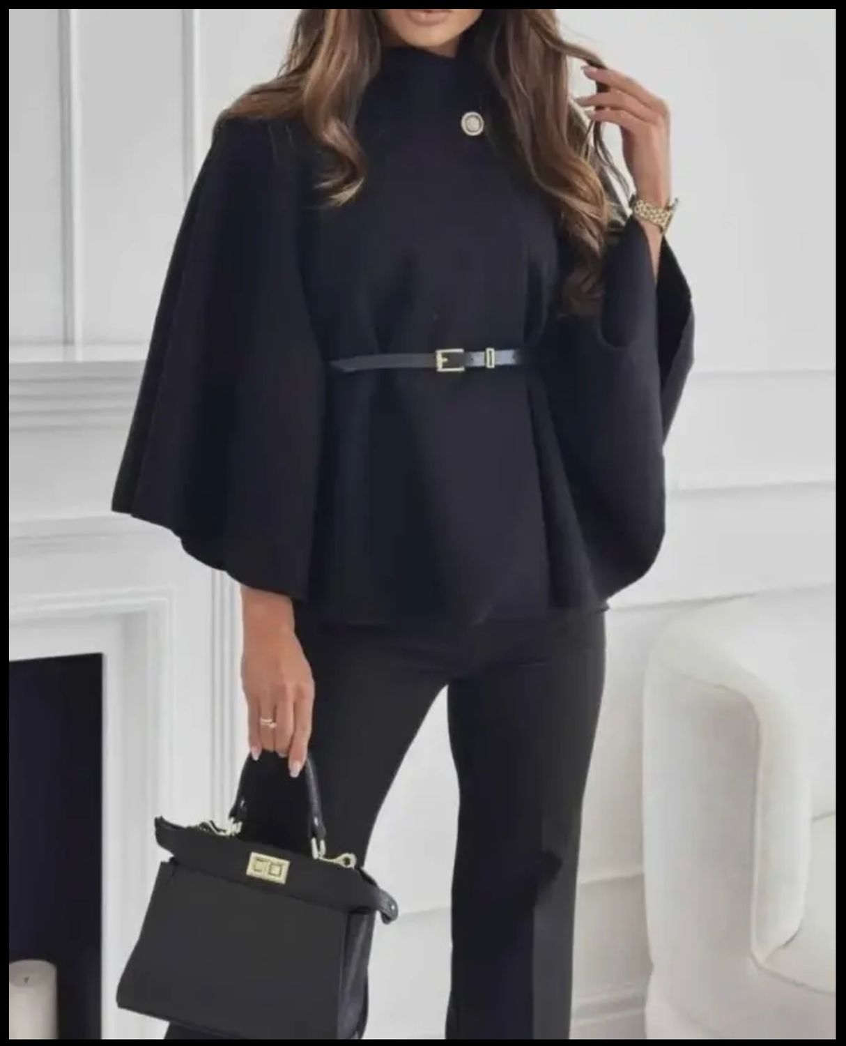 Zwarte poncho