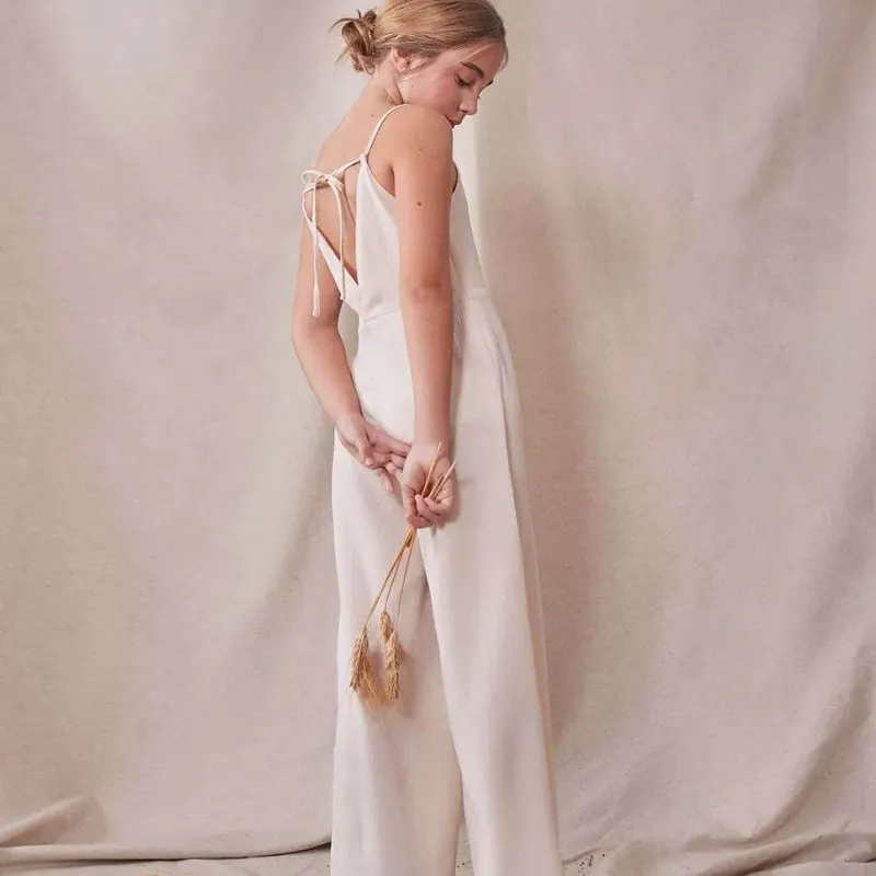 Crèmekleurige jumpsuit, feestcollectie