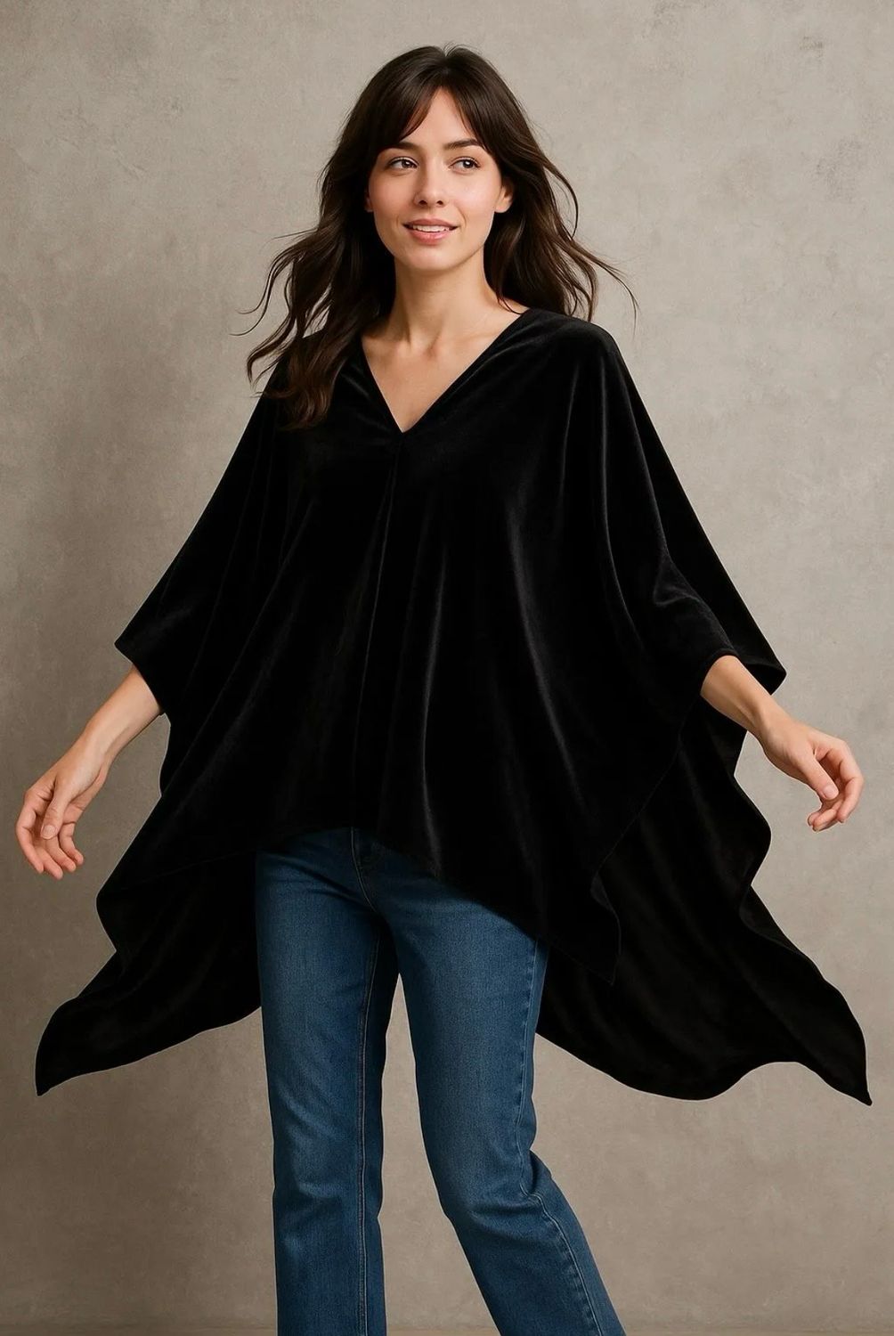 Collezione look per le feste poncho velluto nero