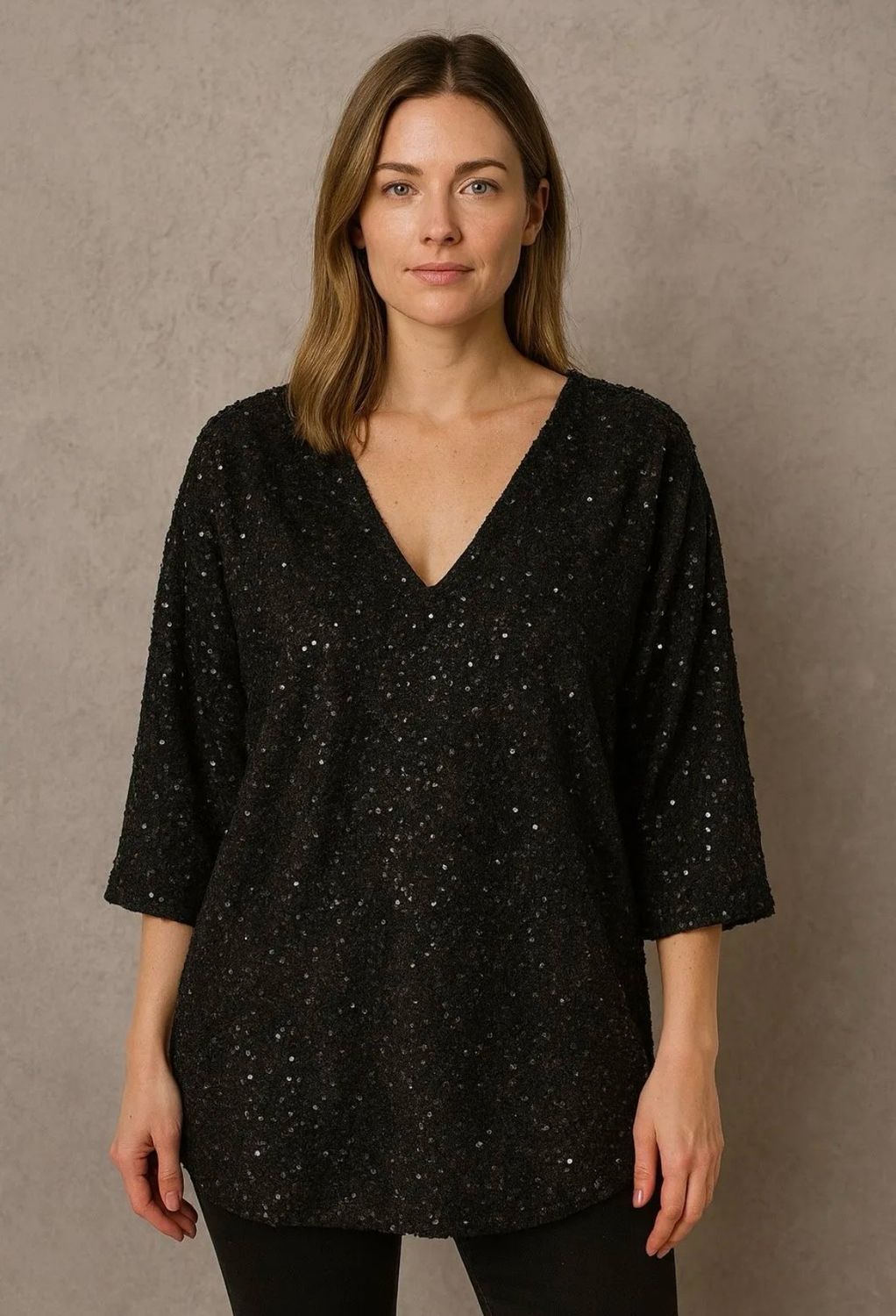 Collezione look per le feste tunica nera paillettes
