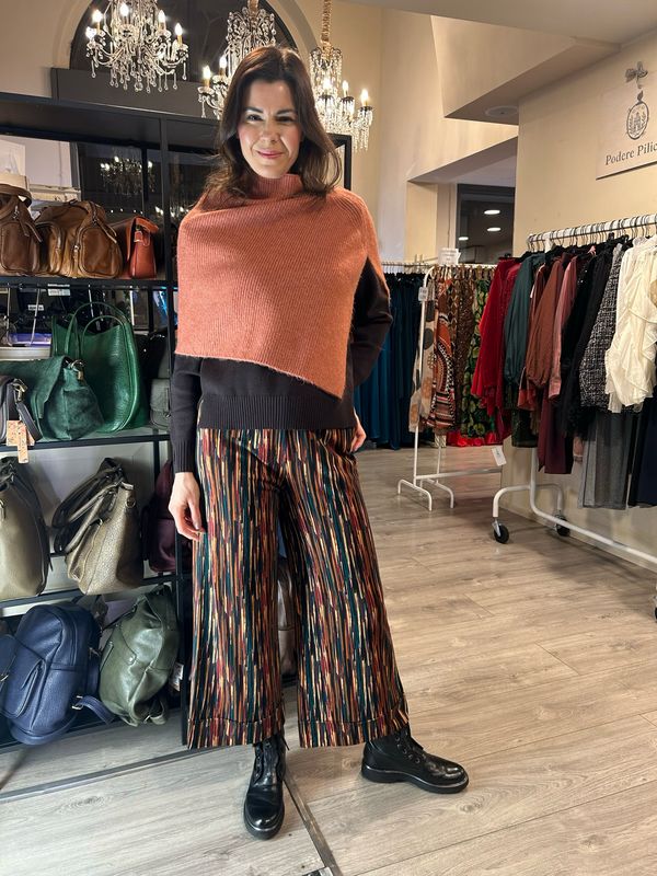 Surkana poncho corto rosa