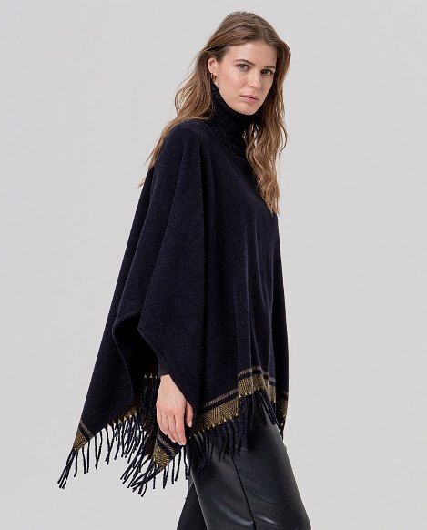 Surkana poncho blu in maglia con frange