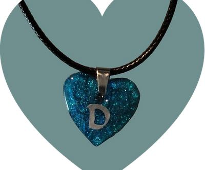 Heart ( initial in gold or silver )