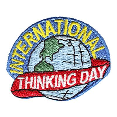 INTERNATIONAL THINKING DAY (ribbbon around globe) AFP