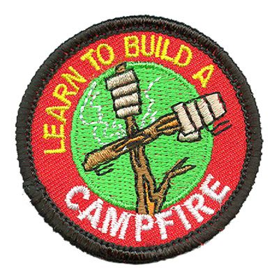 LEARN TO BUILD A CAMP FIRE AFP