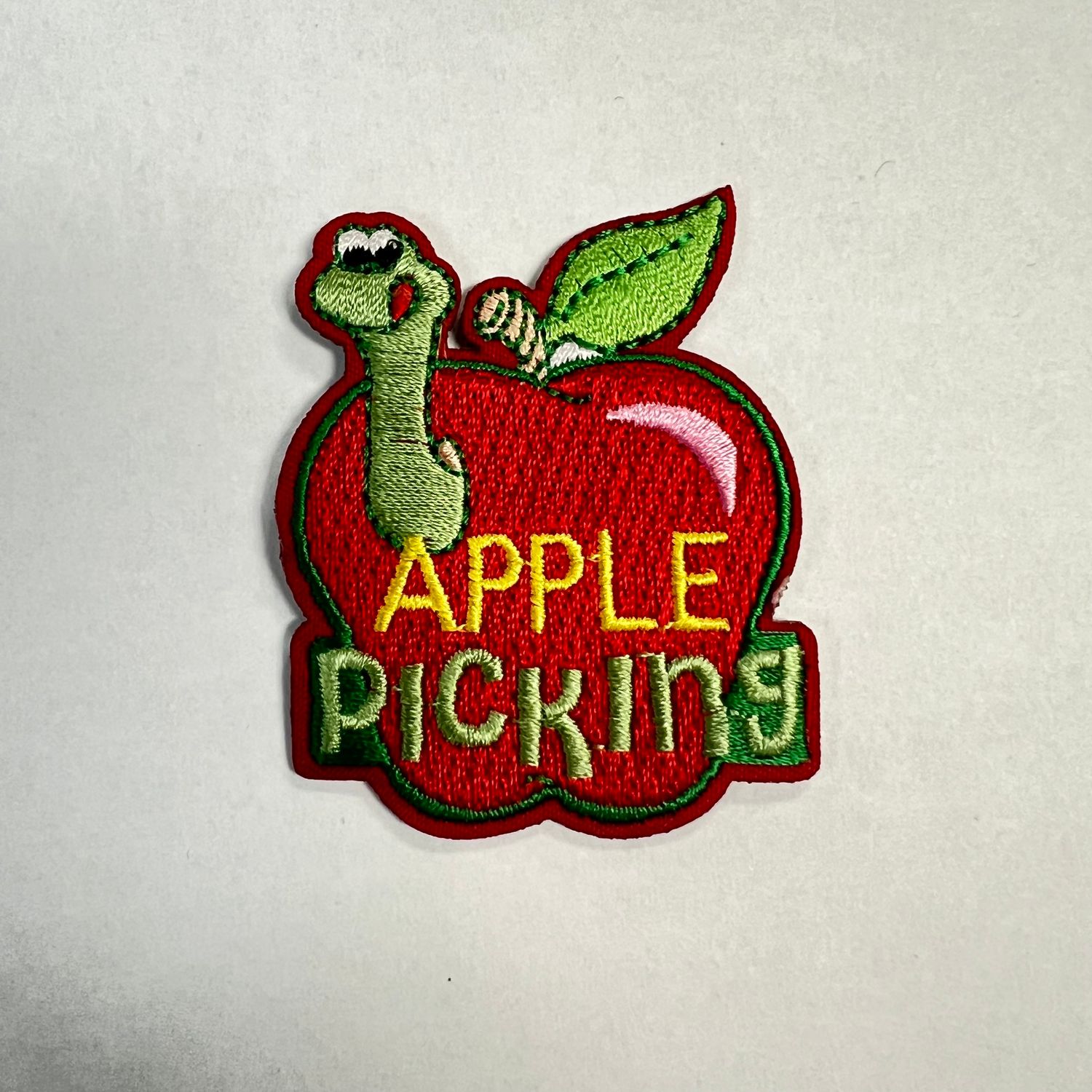 APPLE PICKING (apple with worm)  AFP
