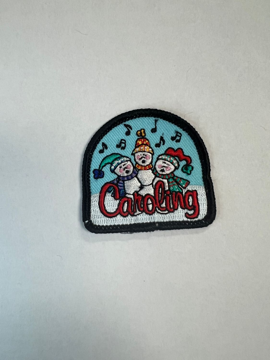 CAROLING (3 snowmen)  AFP