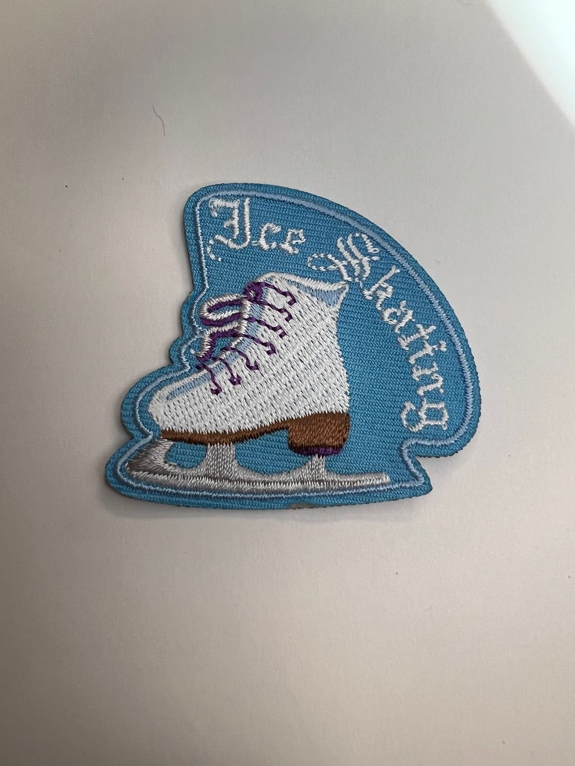 ICE SKATING (white skate)  AFP