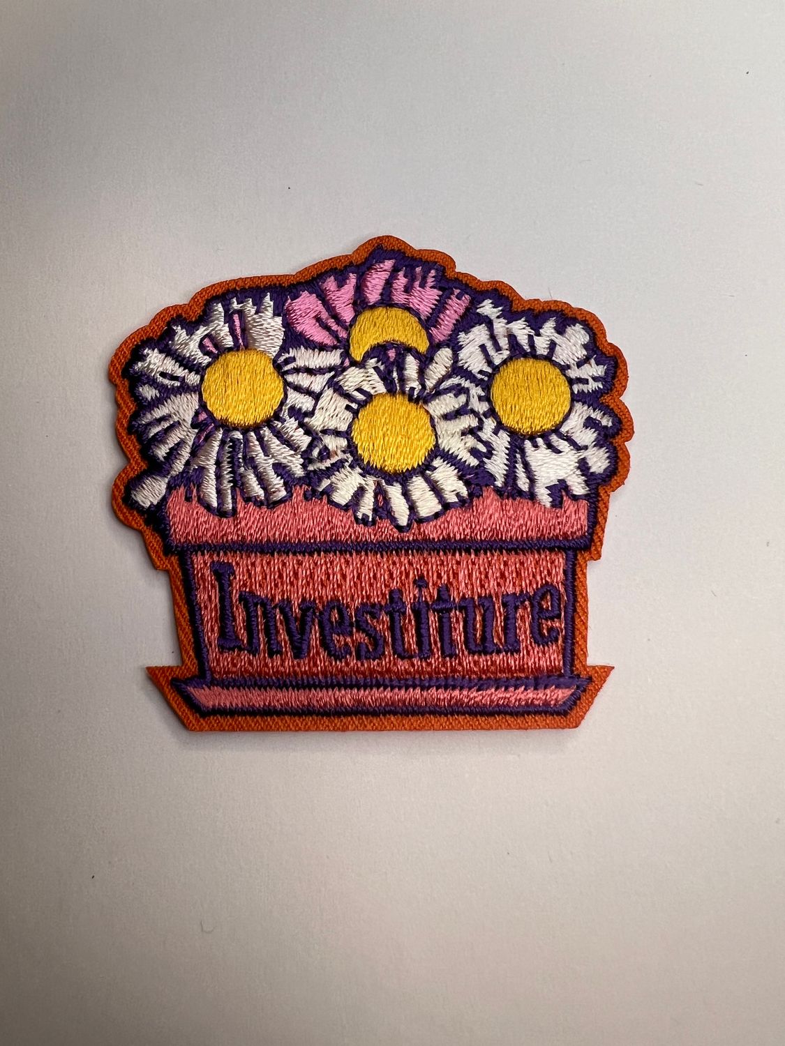 INVESTITURE (daisies in pot) AFP