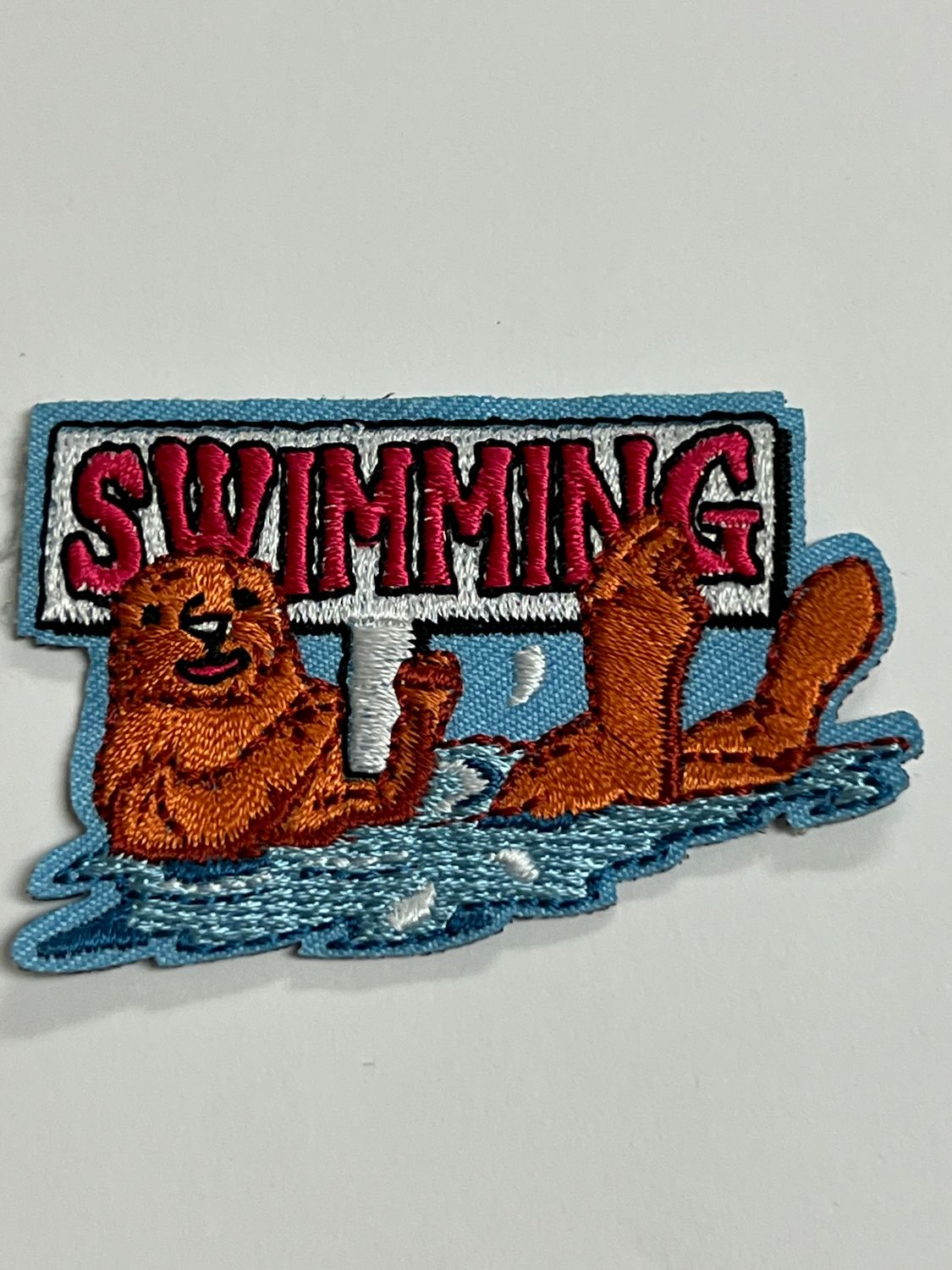 SWIMMING (w/otter) AFP