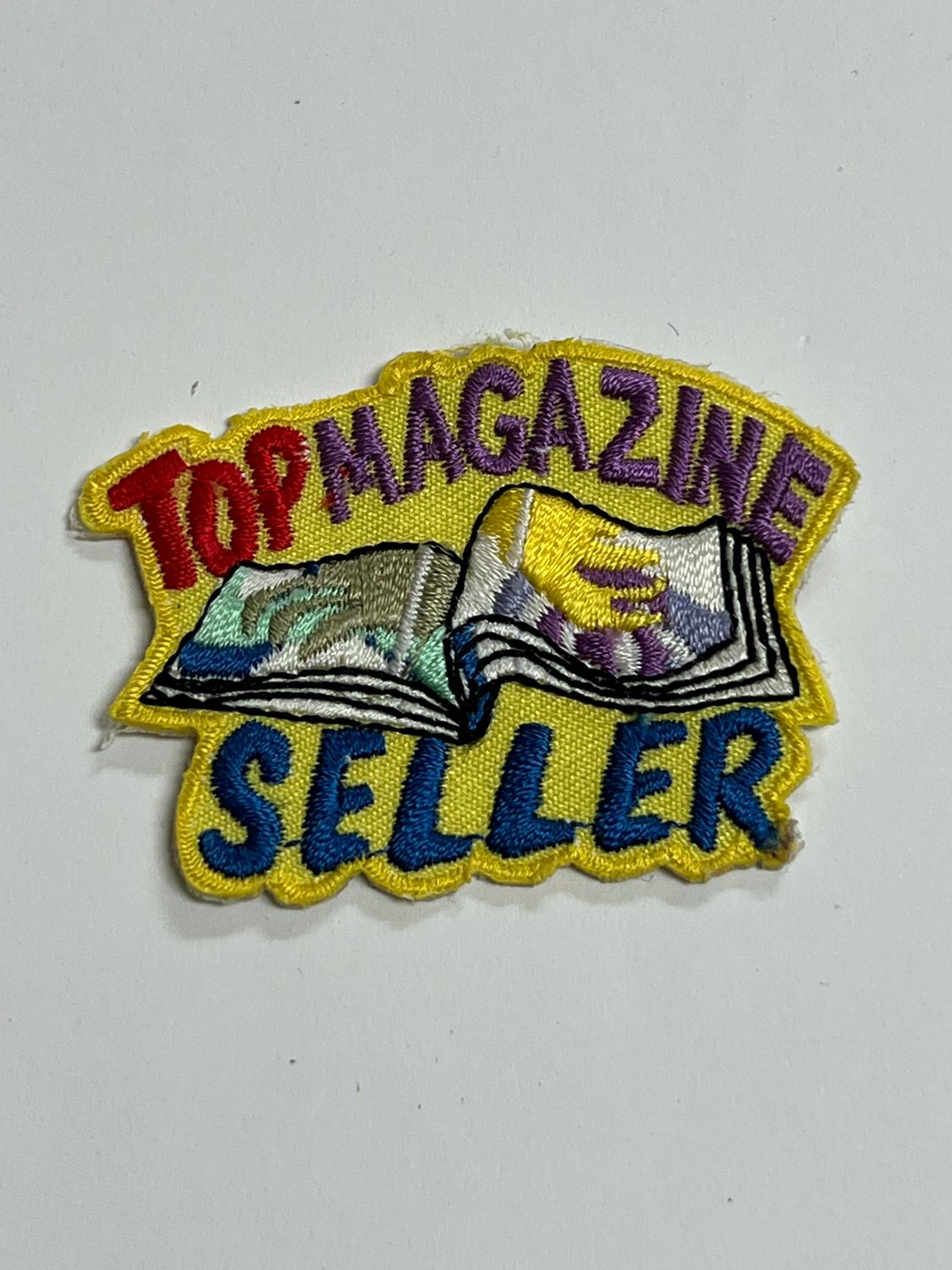 TOP MAGAZINE SELLER (with magazine)  AFP