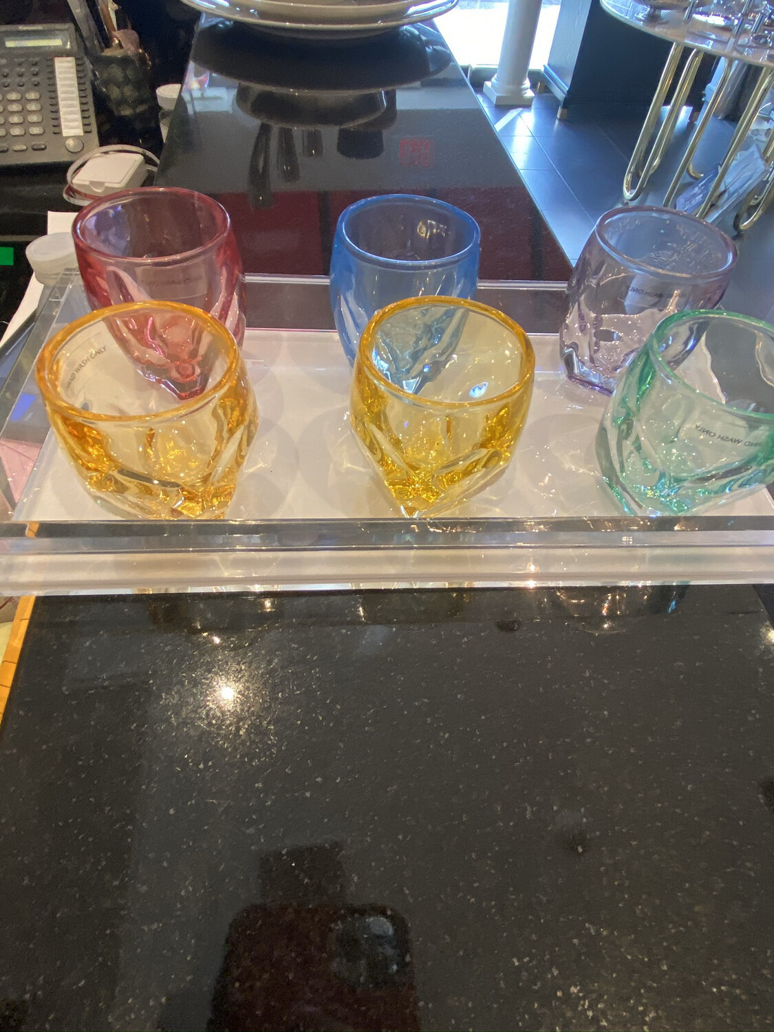 Assorted Shots Glasses On White Acrylic Tray PURCHASED