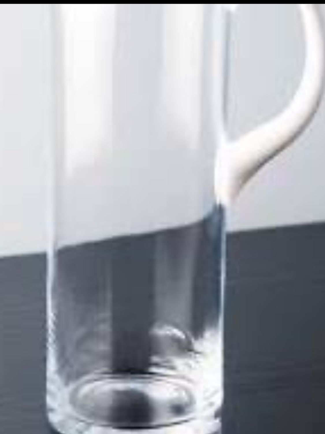 Clear Pitcher White Handle