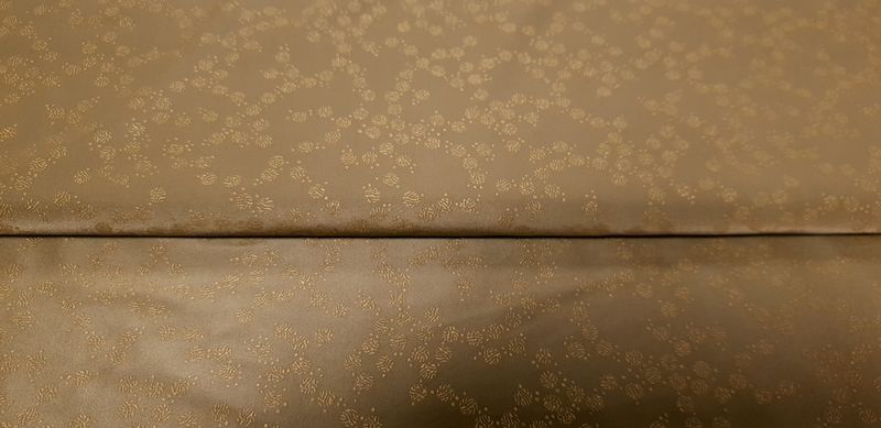 Lycra kaki met fijne bloem goud