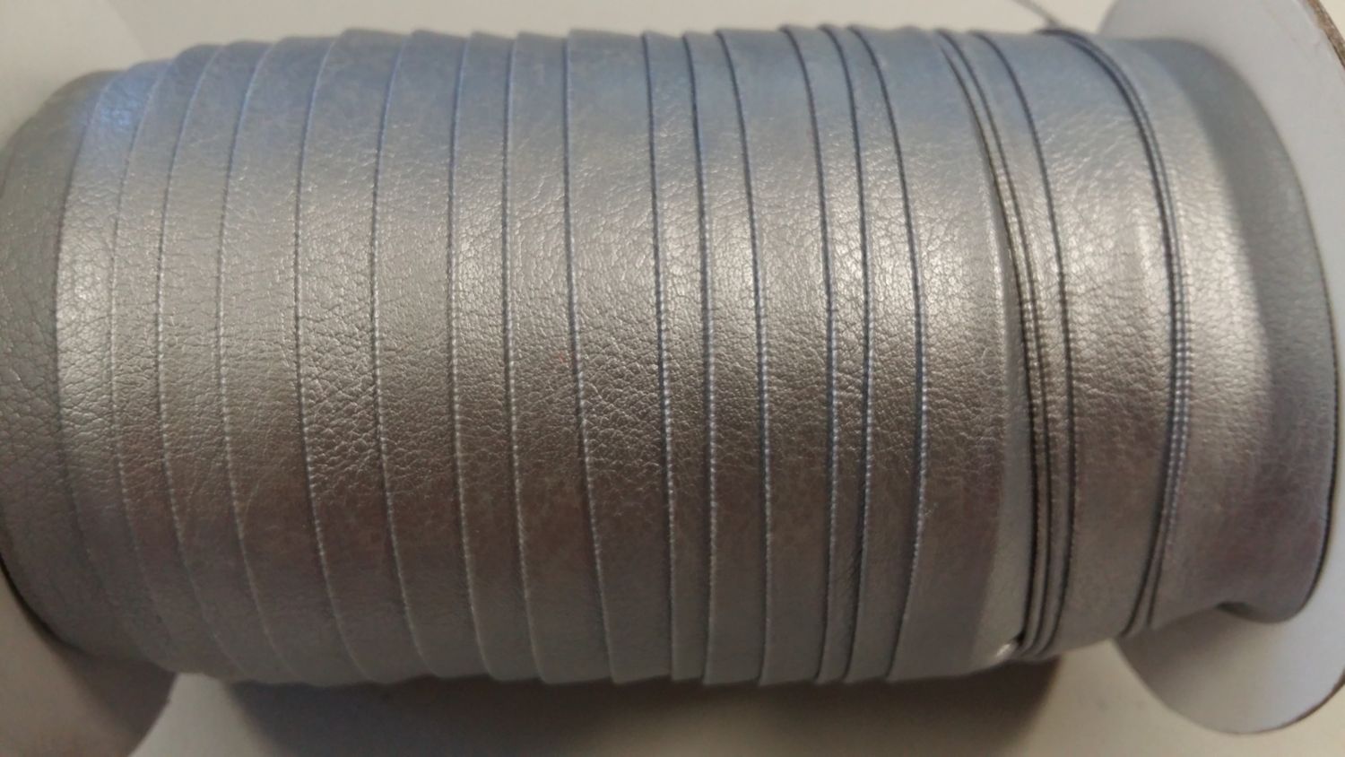 Biais leder zilver