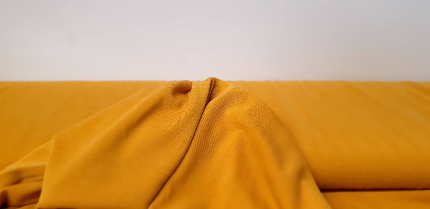 Modal tricot donker geel