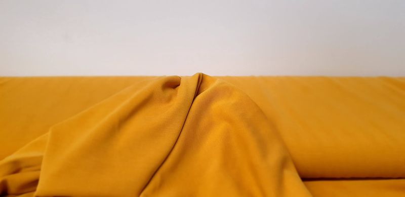 Modal tricot donker geel