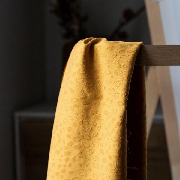 Stretchy spot jacquard amber