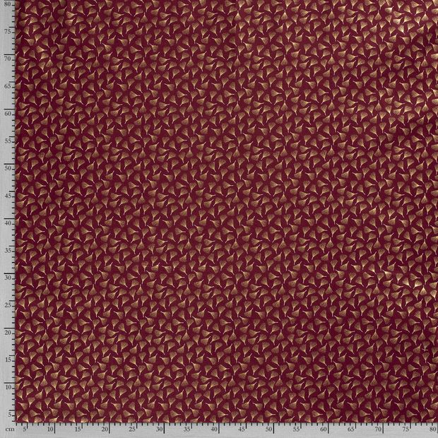 Gold leafs on bordeaux