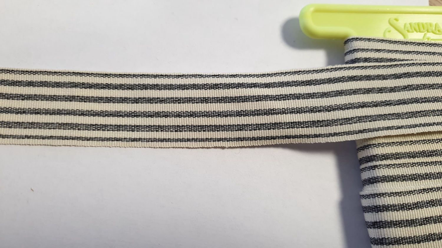 Sierlint ecru/zwart