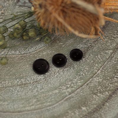 Knoop corozo zwart 11 mm