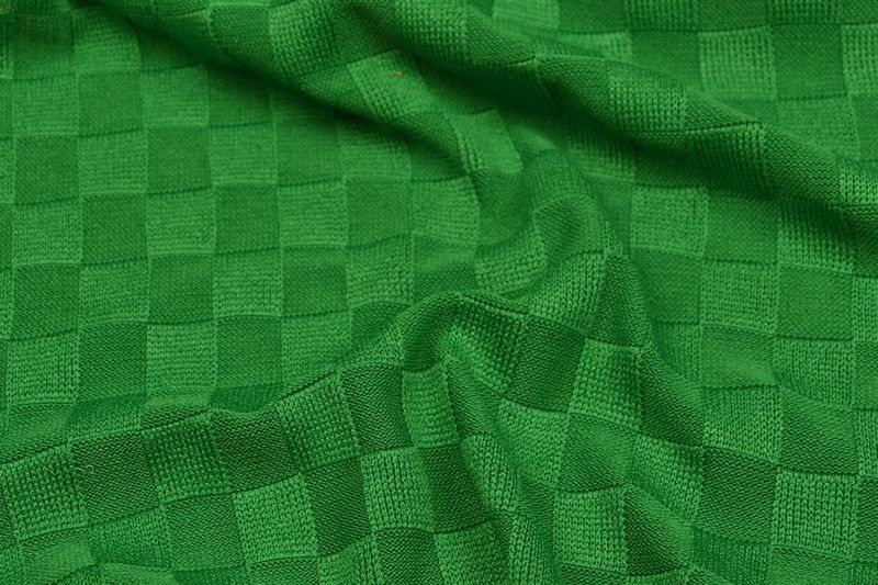 Relief tricot checks groen