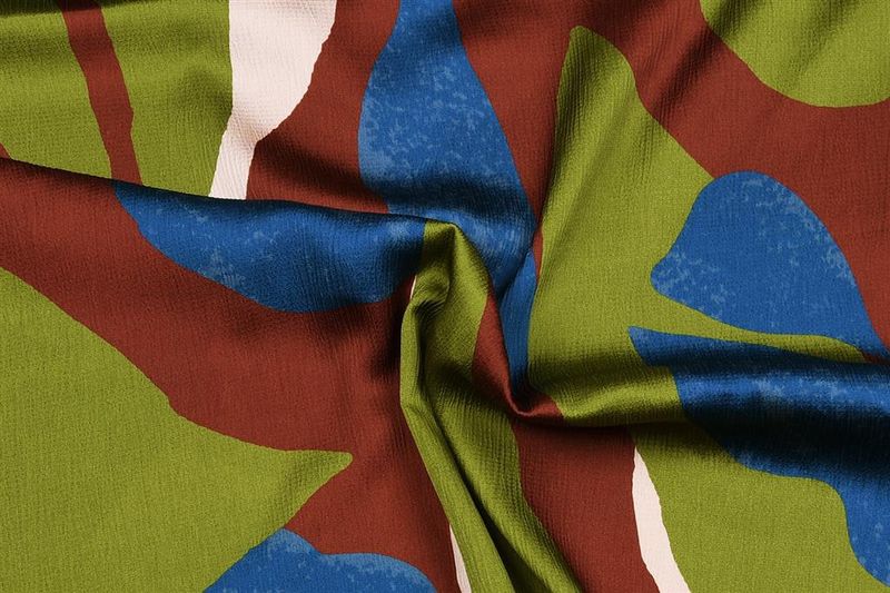 Crepe met abstracte print groen/bruin