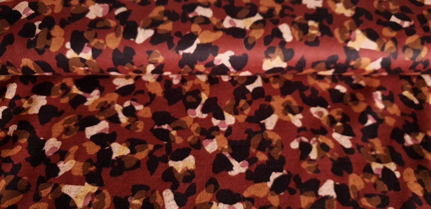 Fijn breisel | doker rood leopart print