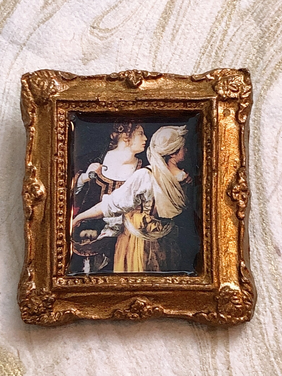 frame brooch (gentileschi's judith)