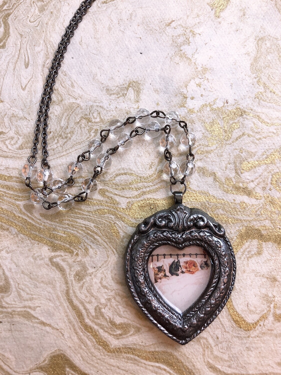 frame necklace (cats in bed)