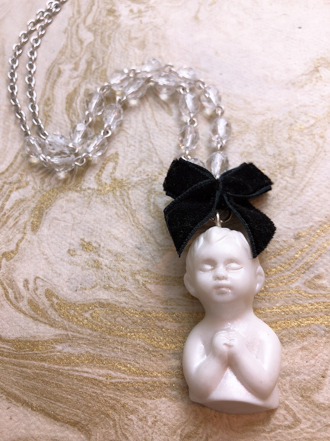 doll parts necklace (praying)