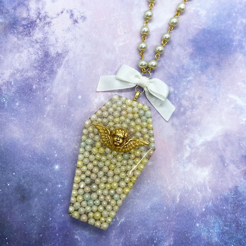 pearl angel coffin necklace